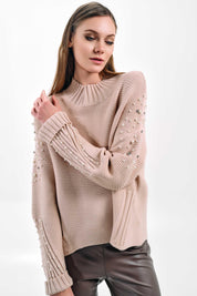 CABLE KNIT SWEATER WITH EMBELLISHED SLEEVES